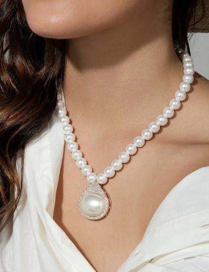 Classic pearl necklace set with elegant pendant.